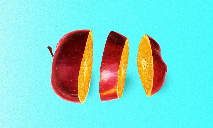 An apple cut three ways, showing the interior of an orange.